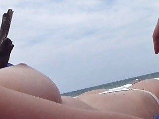 Wife orgasms at the beach
