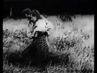 Black and white film man and woman in a field