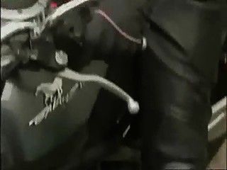 Girl Riding a Motorcycle with dildo plugged in