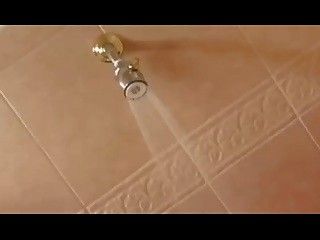 Muscle Milf solo masturbation in the shower