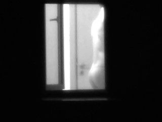Caught neighbors couple ready for sex in the dark window