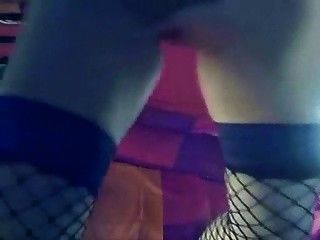 Blonde with fishnet stockings play with two sexy toys