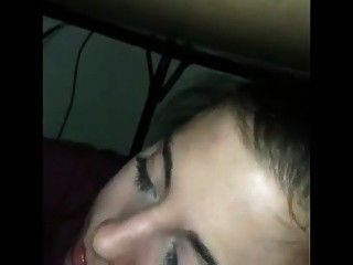 Sucking her bf's cock under the table while he's gaming