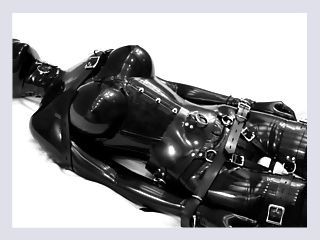 Rubber doll masturbates then is bound and vibrate