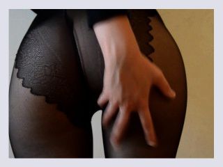 Girl touching her perfect seductive ass in pantyhose