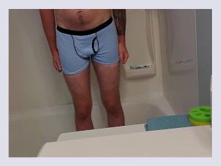 Desperate Young Man Boxer Pissing in Shower