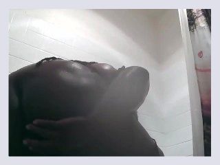 Ebony BBW takes a Shower and some dildo action