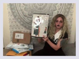 Goth camgirl unboxes sexy supplies for Easter cam show