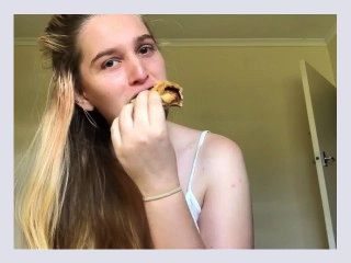 Hot girl eats vegemite scroll