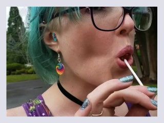 Seattle Ganja Goddess the Queen of Pussy Pops sucking lollipops Cemetery Halloween licking candy
