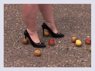 Crush fetish outdoors  Fat legs in high heel shoes crush apples