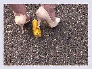 Crush fetish Thick legs in heels crushed the corn mercilessly