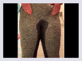 Teen pee desperation in grey yoga pants 901