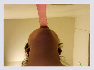 Teen tries to deep throat pink toy