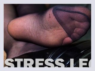 Feet is resting in black pantyhose after photoset Soles close ups