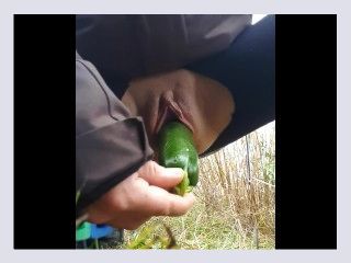 Horny Little Milf Fucks A Zucchini Outside In Public By The Highway 