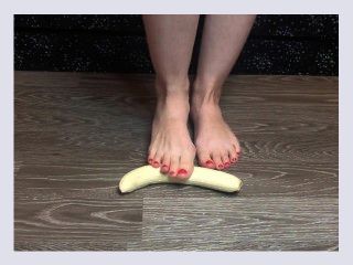 Food banana crushing with feet   foot crushing red toes
