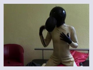 Latex Catsuit Girl Plays Breath Control With Rubber Ball Hood  Breath Bag