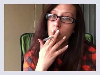 Hot Brunette in Plaid Shirt and Glasses Smoking White Filter 100 Cigarette