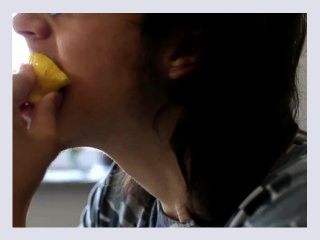 Sensually eating lemons