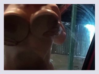 Happy obedient sub told to clean the car with her huge tits