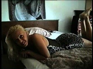 Blonde posing in bed 