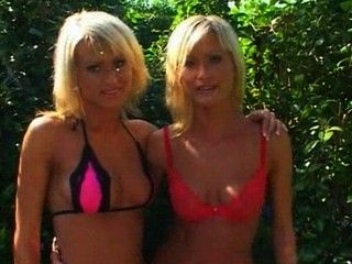 Hot twins play with their pussies