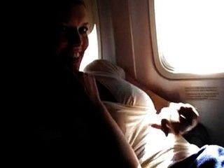 Naughty amateur masturbating on a plane