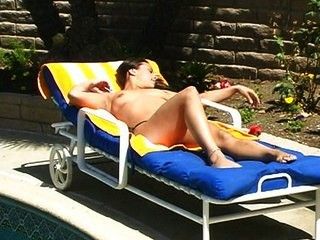 Amateur girl masturbating by pool