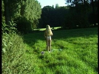 Naked Gymnast Performs Outdoors
