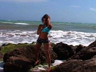 Karla naked on a beach