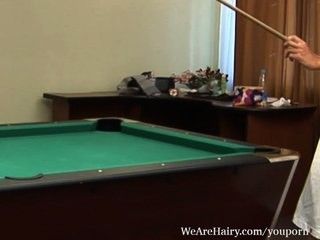 Hairy Kristina plays with balls