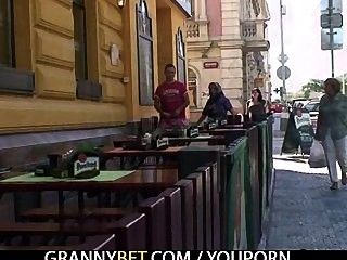 Moaning granny rides young meat