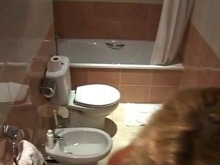 Horny blonde in the bathroom part 1