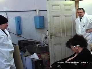 Busty Kim sucks off two workers part 1